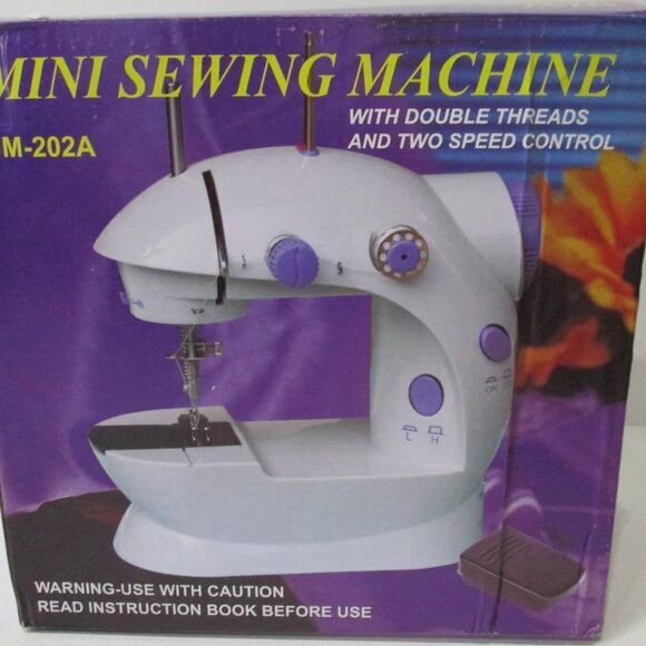 Mini Sewing Machine w/Double Threads, 2 Speed Control, Foot Pedal, AC/DC SM-202A - Picture 1 of 13